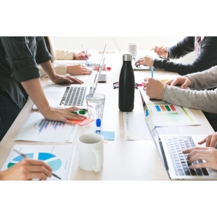hands-on-desk-at-meeting.jpg